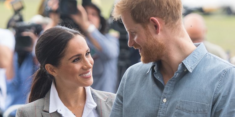 Prince Harry held Meghan Markle’s hand behind his back with both of his hands, taking their PDA to a whole new level