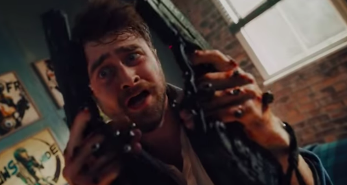 Daniel Radcliffe can’t get rid of his gun hands in the wild new trailer for Guns Akimbo: Watch