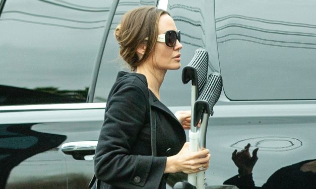 Angelina Jolie Carries Shiloh’s Crutches While Going to the Movies