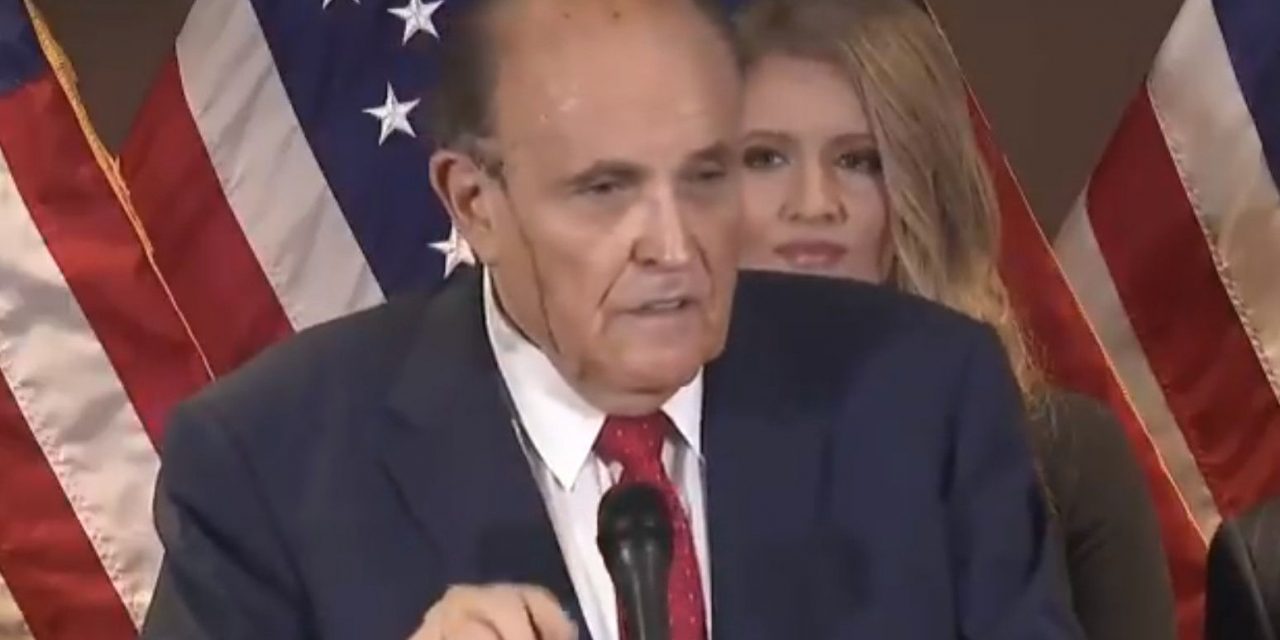 WATCH: Rudy Giuliani just melted during a press conference. So did his make-up.
